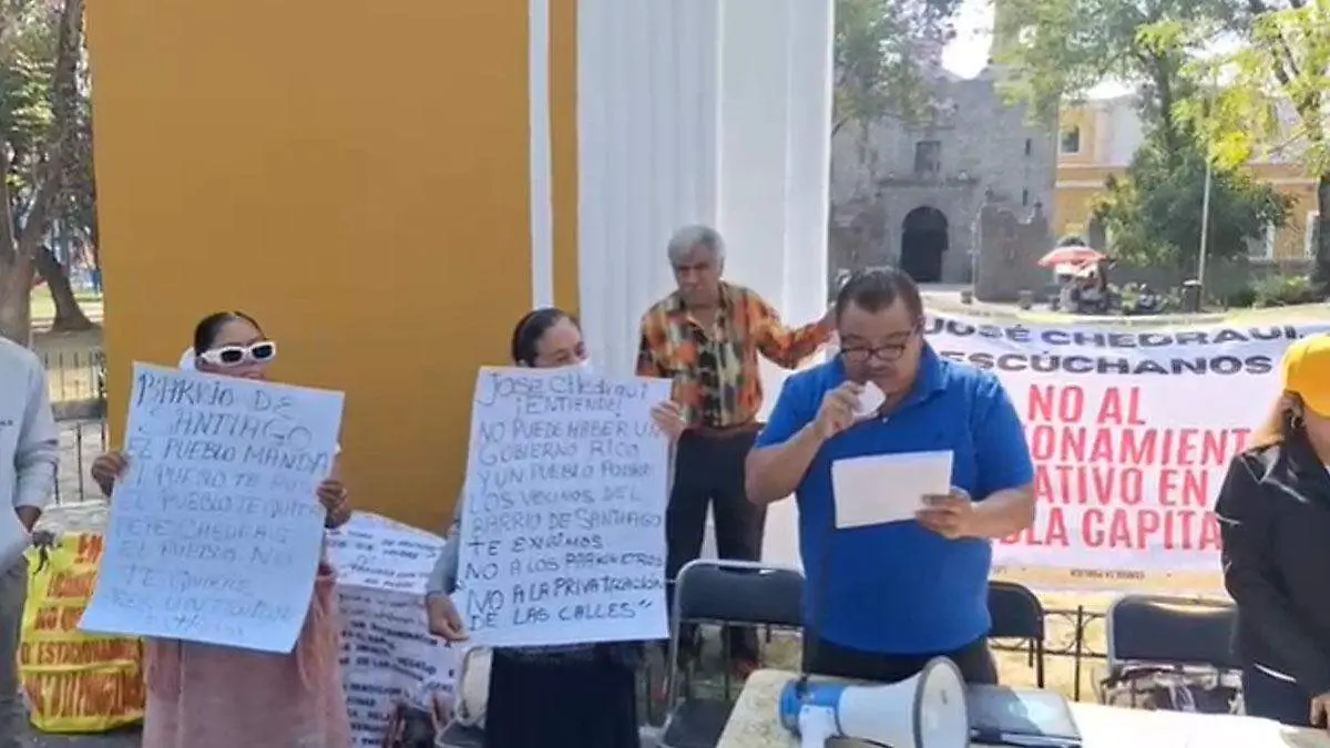 Vecinos piden a diputados votar en contra de los parquímetros en Puebla capital